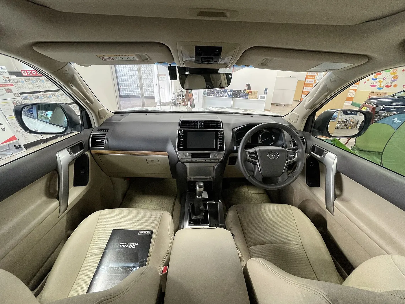 Inside a Toyota Land Cruiser Prado — dashboard and seating