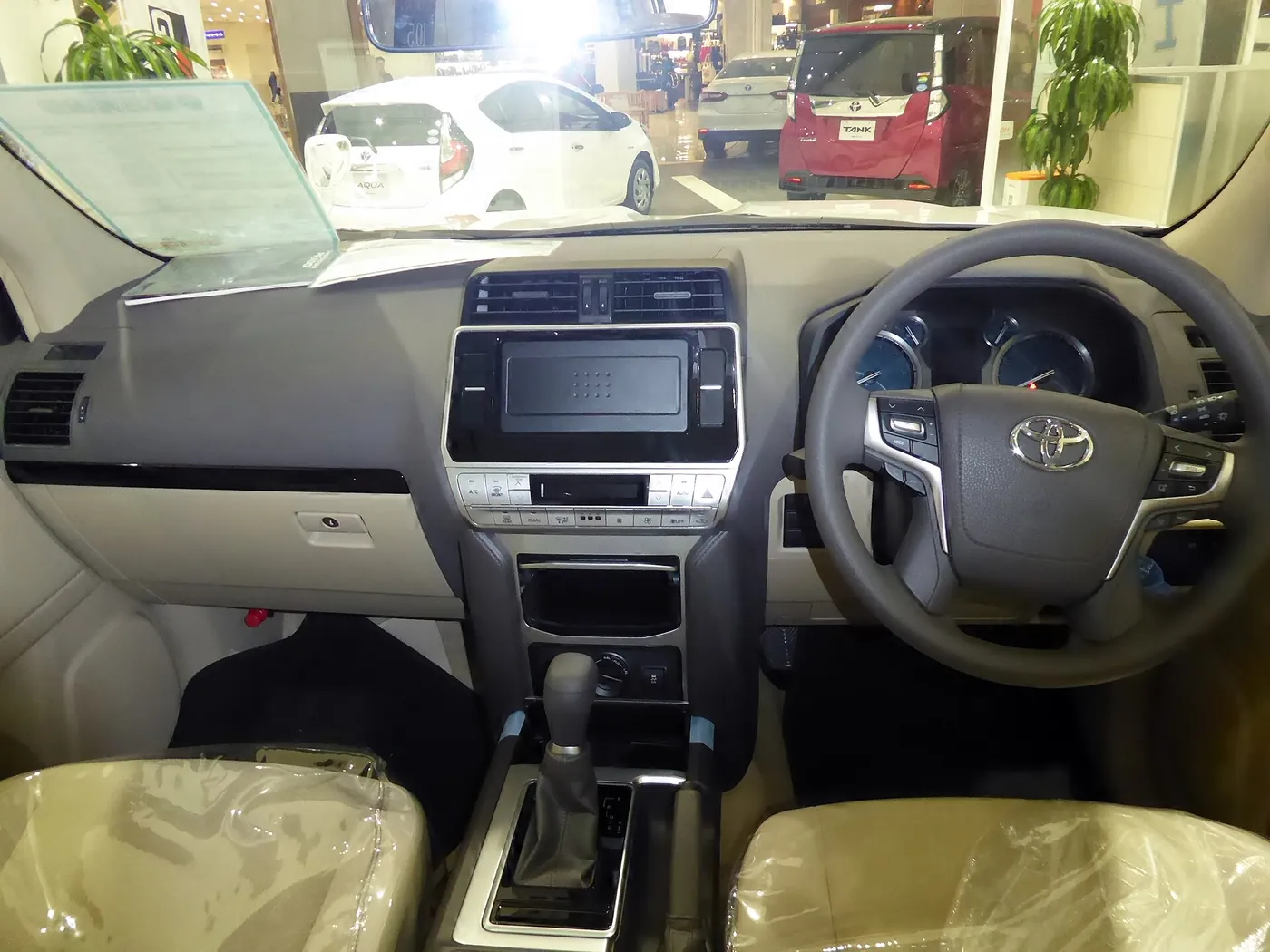 Inside a Toyota Land Cruiser Prado — dashboard and seating