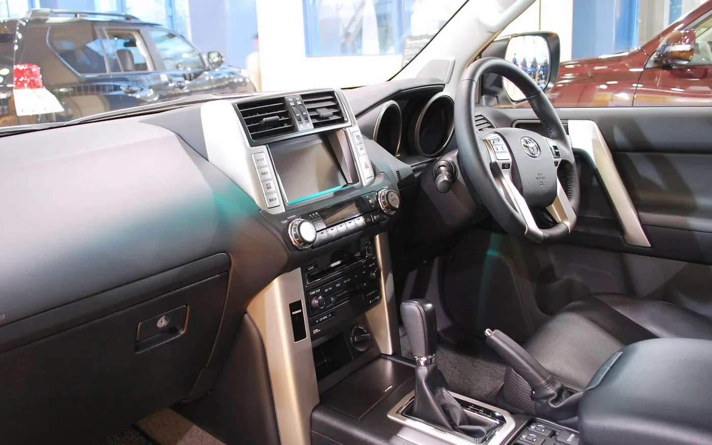 Inside a Toyota Land Cruiser Prado — dashboard and seating